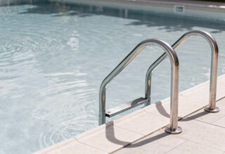 Can I Swim in Cloudy Pool Water? Safety Risks Explained